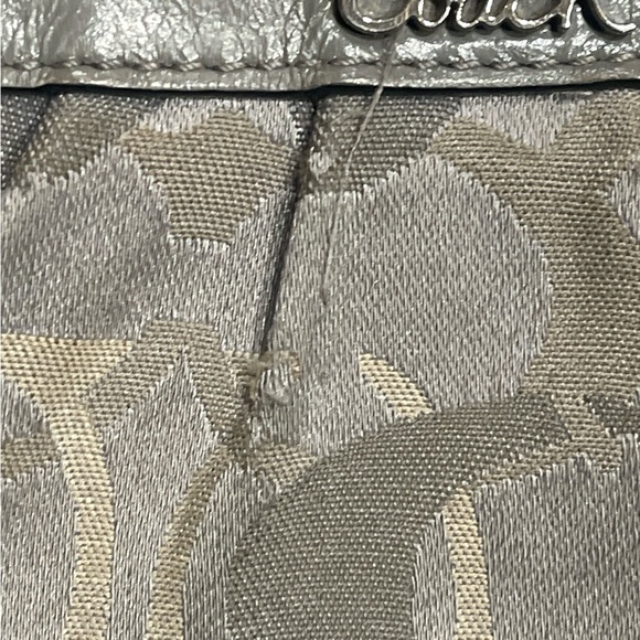 Grey cloth coach wristlet with leather accents and strap. Silver color. - Picture 4 of 11